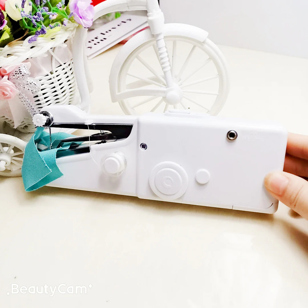 Handheld Portable Stitch Machine 6 Handheld Portable Stitch Machine On Table