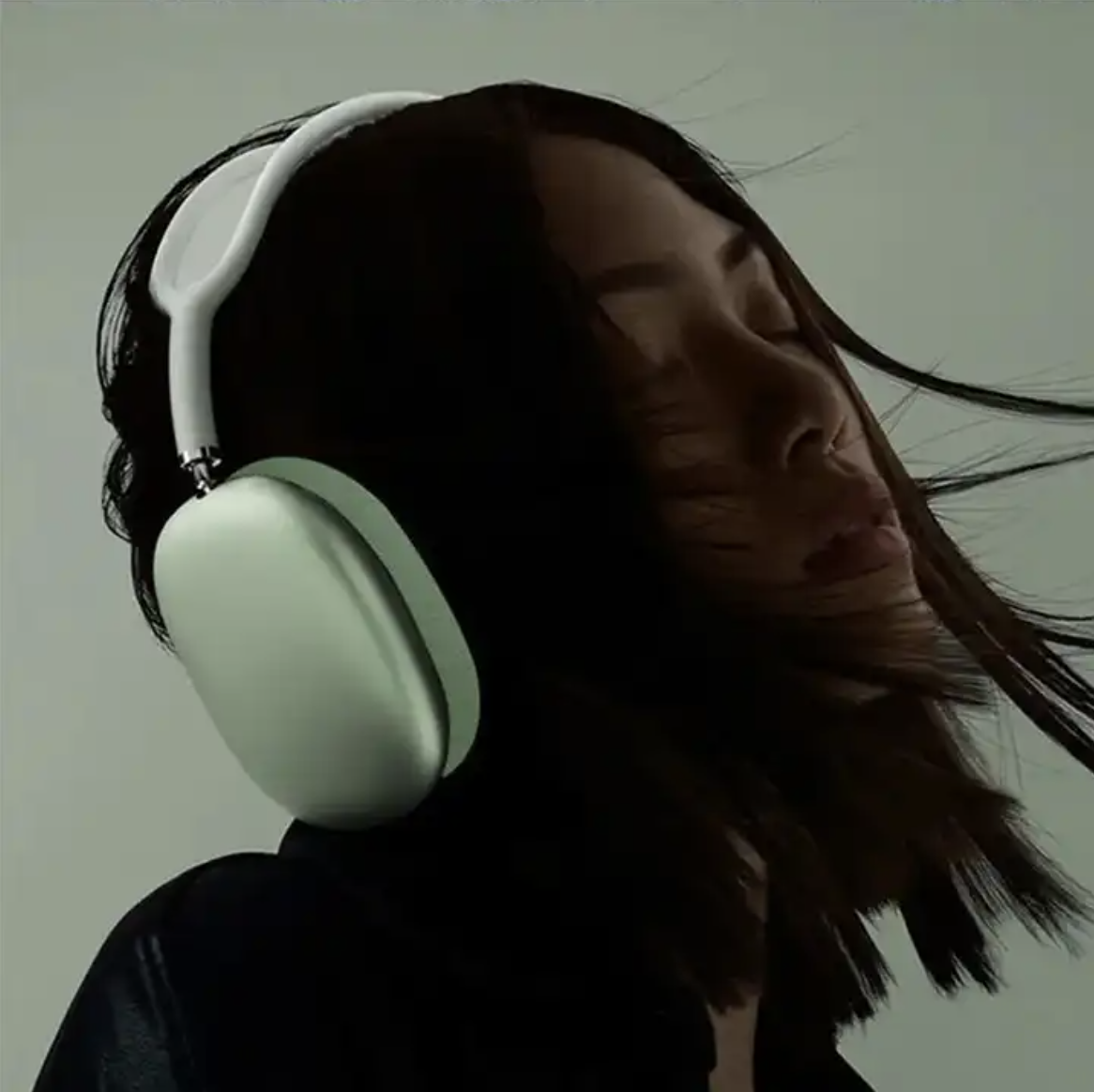 Girl wearing P9 Headphones in green
