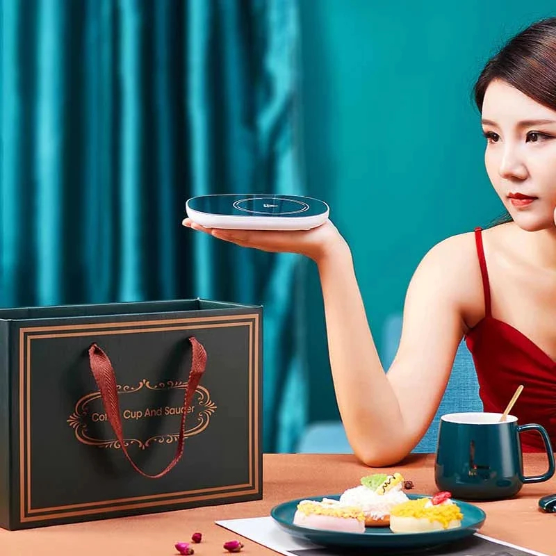 Coffee Warmer 3 Coffee Warmer in a palm