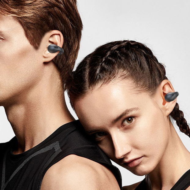 Bone Conduction Headphones worn by a couple